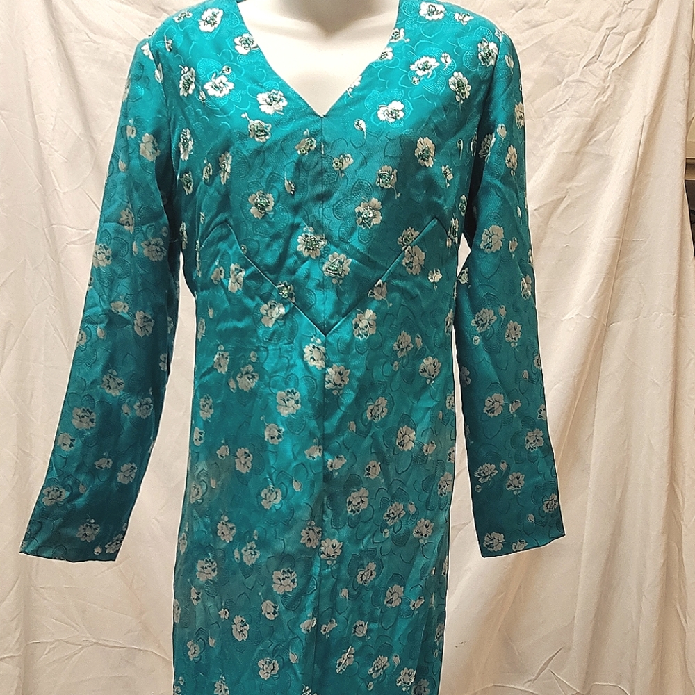 Vintage Turquoise Gown with some beading.